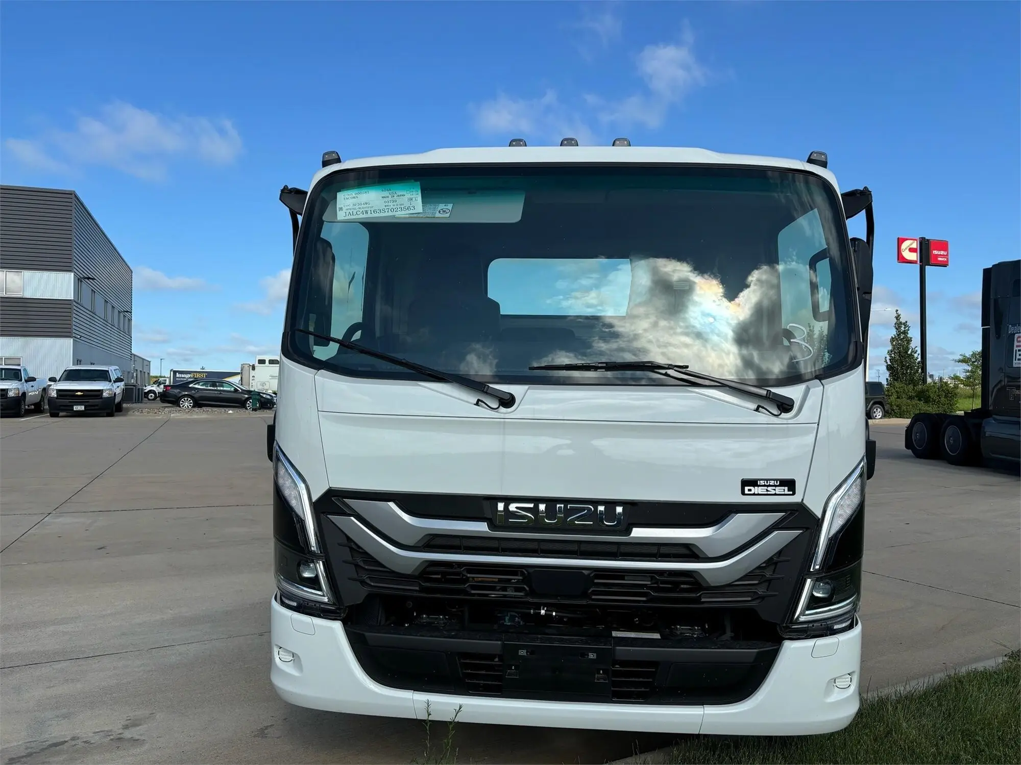 2025 Isuzu NPR in Cedar Rapids, IA — photo 2